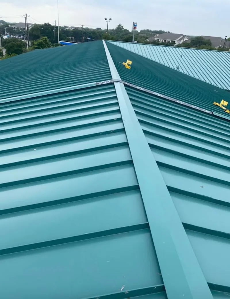 Green commercial metal roof ridge and valley for Metal Roof Repair in Mashpee