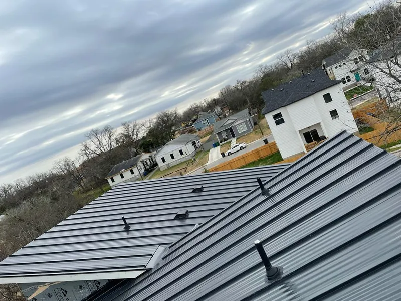 Standing seam metal roof panels with vents for Skylight Repair in Mashpee